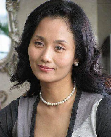 儿子是当红明星，女儿是奥运冠军，51岁的她才是人生赢家